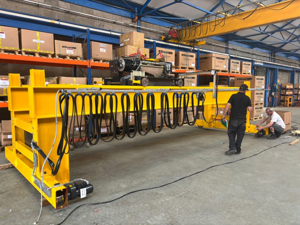 overhead crane The Evolution of the Overhead Crane: From Steam to Smart Lifting Systems